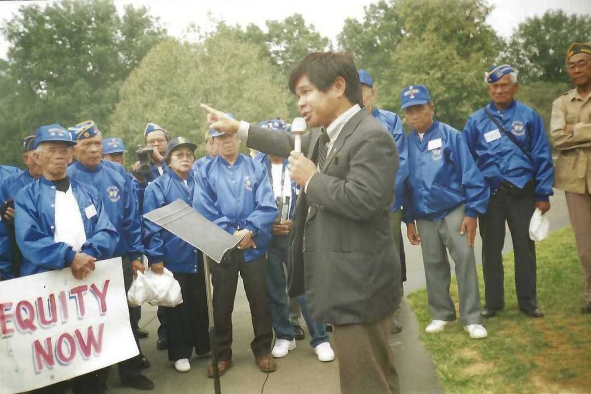 Jon Melegrito speaks at a protest. 