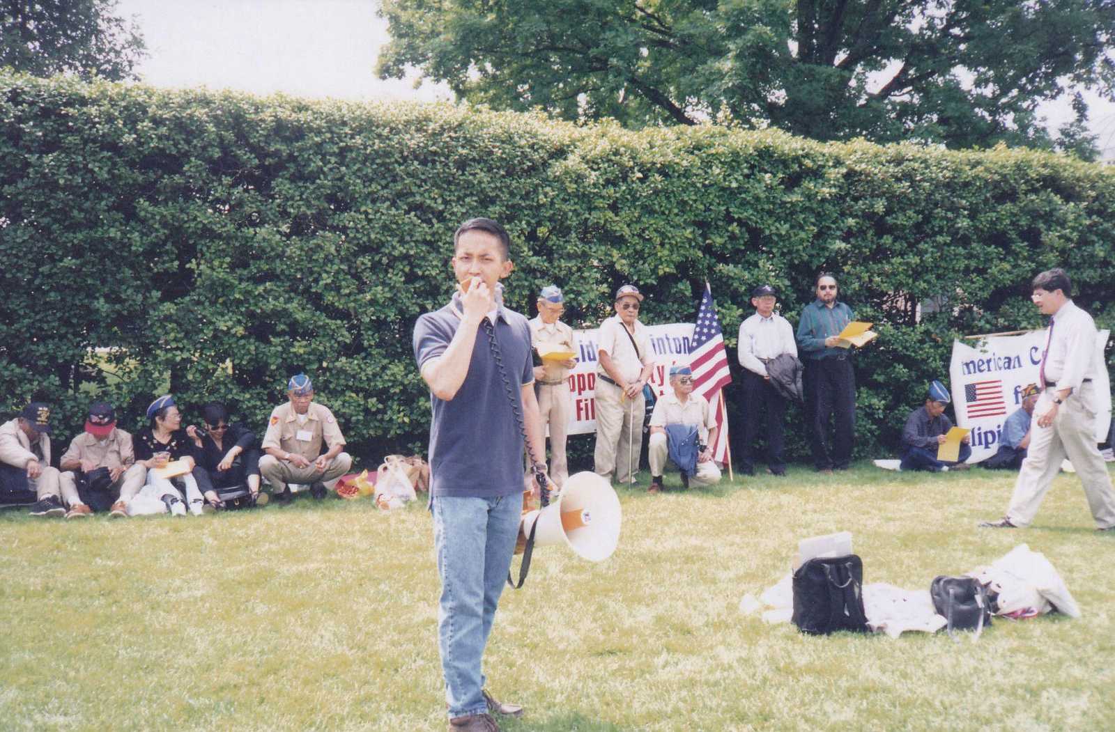 Rodney Salinas speaks at a protest